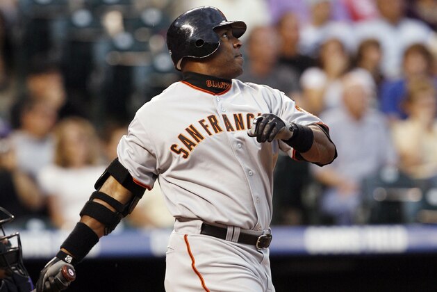 San Francisco Giants' Barry Bonds follows the flight of his two-run home run off Colorado Rockies starting pitcher Ubaldo Jimenez in the first inning of a baseball game in Denver on Wednesday, Sept. 5, 2007. (AP Photo/David Zalubowski)