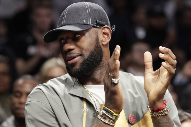 Chris Paul and LeBron James applaud during a ceremony at an NBA basketball game between the Brooklyn Nets and the Miami Heat, Wednesday, April 10, 2019, in New York. The pair were there to watch Heat guard Dwyane Wade play his last NBA game. (AP Photo/Kathy Willens) Chris Paul and LeBron James applaud during a ceremony at an NBA basketball game between the Brooklyn Nets and the Miami Heat, Wednesday, April 10, 2019, in New York. The pair were there to watch Heat guard Dwyane Wade play his last NBA game. (AP Photo/Kathy Willens)