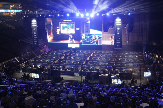 Fans watch as 80 players simultaneously fight for survival in an eSports match of upstart computer game PlayUnknown's Battlegrounds at an Intel Extreme Masters tournament in the Oracle Arena in Oakland, California on November 18, 2017.
Scores of virtual warriors faced-off in a Hunger Games-style death match here in a massive, real-world eSports match-up of upstart shooter game