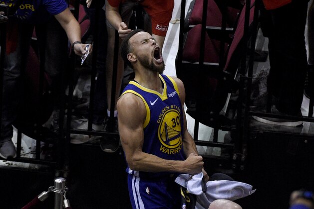 Golden State Warriors' Stephen Curry celebrates as he walks off the court following Game 6 of the team's second-round NBA basketball playoff series against the Houston Rockets on Friday, May 10, 2019, in Houston. (AP Photo/Eric Christian Smith)