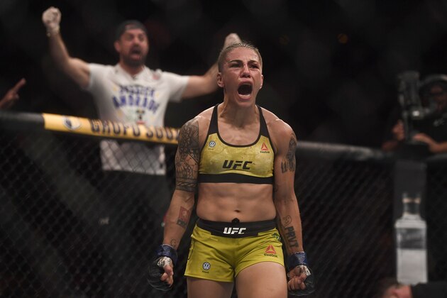 Brazilian fighter Jessica Andrade celebrates her victory against US fighter Rose Namajunas during their women's strawweight title bout at the Ultimate Fighting Championship 237 event (UFC 237) at Jeunesse Arena in Rio de Janeiro on May 11, 2019. (Photo by Mauro Pimentel / AFP)        (Photo credit should read MAURO PIMENTEL/AFP/Getty Images)