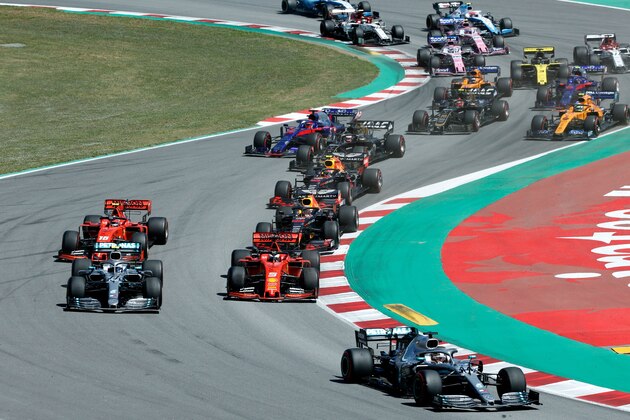 Mercedes' British driver Lewis Hamilton (bottom R) leads the Spanish Formula One Grand Prix at the Circuit de Catalunya in Montmelo in the outskirts of Barcelona on May 12, 2019. (Photo by PAU BARRENA / AFP)        (Photo credit should read PAU BARRENA/AFP/Getty Images)