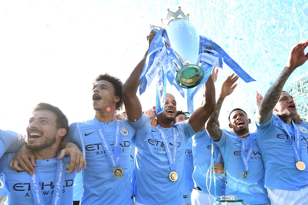 BRIGHTON, ENGLAND - MAY 12: Vincent Kompany of Manchester City lifts the Premier League Trophy after winning the title during the Premier League match between Brighton & Hove Albion and Manchester City at American Express Community Stadium on May 12, 2019 in Brighton, United Kingdom. (Photo by Michael Regan/Getty Images)