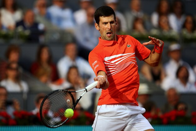 MADRID, SPAIN - MAY 12:  Novak Djokovic of Serbia in action against Stefanos Tsitsipas of Greece in the final during day nine of the Mutua Madrid Open at La Caja Magica on May 12, 2019 in Madrid, Spain. (Photo by Julian Finney/Getty Images)
