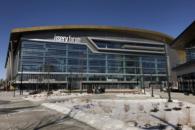 The Fiserv Forum, Milwaukee's new downtown arena that opened in the summer of 2018, is seen on Monday, March 11, 2019. Democrats picked Milwaukee on Monday to host their 2020 national convention, setting up the party's standard-bearer to accept the presidential nomination in the heart of the old industrial belt that delivered Donald Trump to the White House. Democratic Party proceedings will play out in the 17,500-seat arena that Republican Wisconsin Gov. Scott Walker helped build for the NBA's Milwaukee Bucks by securing public financing from state lawmakers.  (AP Photo/Carrie Antlfinger)