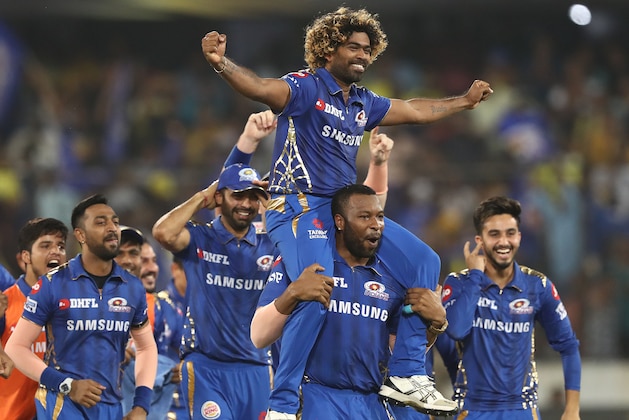 HYDERABAD, INDIA - MAY 12: The Mumbai Indians celebrate after they defeated the Chennai Super Kings during the Indian Premier League Final match between the the Mumbai Indians and Chennai Super Kings at Rajiv Gandhi International Cricket Stadium on May 12, 2019 in Hyderabad, India. (Photo by Robert Cianflone/Getty Images)