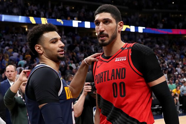 DENVER, COLORADO - MAY 12: Jamal Murray #27 of the Denver Nuggets congratulates Enes Kanter #00 the Portland Trail Blazers on their win during Game Seven of the Western Conference Semi-Finals of the 2019 NBA Playoffs at the Pepsi Center on May 12, 2019 in Denver, Colorado. NOTE TO USER: User expressly acknowledges and agrees that, by downloading and or using this photograph, User is consenting to the terms and conditions of the Getty Images License Agreement. (Photo by Matthew Stockman/Getty Images)