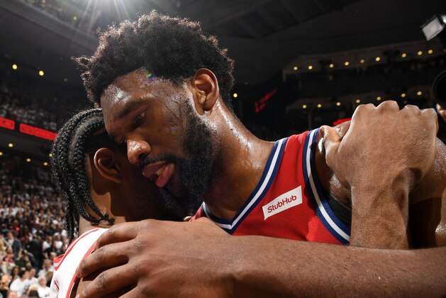 TORONTO, CANADA - MAY 12: Kawhi Leonard #2 of the Toronto Raptors hugs Joel Embiid #21 of the Philadelphia 76ers after the Toronto Raptors win Game Seven of the Eastern Conference Semi-Finals of the 2019 NBA Playoffs against the Philadelphia 76ers on May 12, 2019 at the Scotiabank Arena in Toronto, Ontario, Canada.  NOTE TO USER: User expressly acknowledges and agrees that, by downloading and or using this Photograph, user is consenting to the terms and conditions of the Getty Images License Agreement.  Mandatory Copyright Notice: Copyright 2019 NBAE (Photo by Ron Turenne/NBAE via Getty Images)