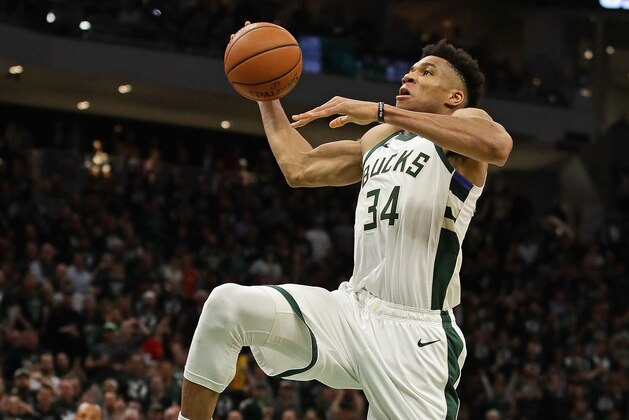 MILWAUKEE, WISCONSIN - MAY 08: Giannis Antetokounmpo #34 of the Milwaukee Bucks dunks against the Boston Celtics at Fiserv Forum on May 08, 2019 in Milwaukee, Wisconsin. The Bucks defeated the Celtics 116-91. NOTE TO USER: User expressly acknowledges and agrees that, by downloading and or using this photograph, User is consenting to the terms and conditions of the Getty Images License Agreement. (Photo by Jonathan Daniel/Getty Images)