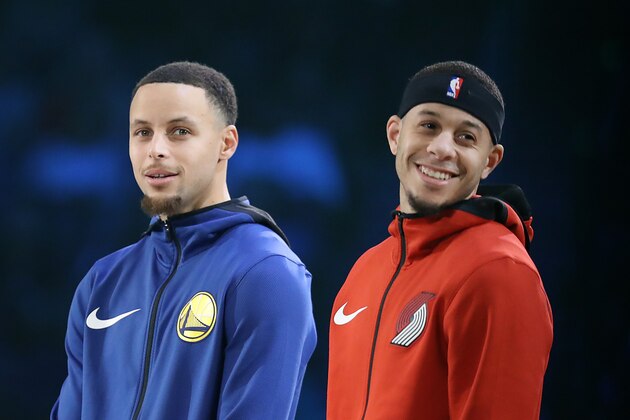 CHARLOTTE, NORTH CAROLINA - FEBRUARY 16: (L-R) Stephen Curry #30 of the Golden State Warriors and Seth Curry #31 of the Portland Trail Blazers look on before the MTN DEW 3-Point Contest as part of the 2019 NBA All-Star Weekend at Spectrum Center on February 16, 2019 in Charlotte, North Carolina. (Photo by Streeter Lecka/Getty Images)