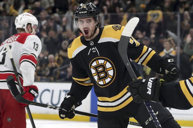 Boston Bruins' Connor Clifton (75) celebrates his goal against the Carolina Hurricanes during the second period in Game 2 of the NHL hockey Stanley Cup Eastern Conference final series, Sunday, May 12, 2019, in Boston. (AP Photo/Charles Krupa)