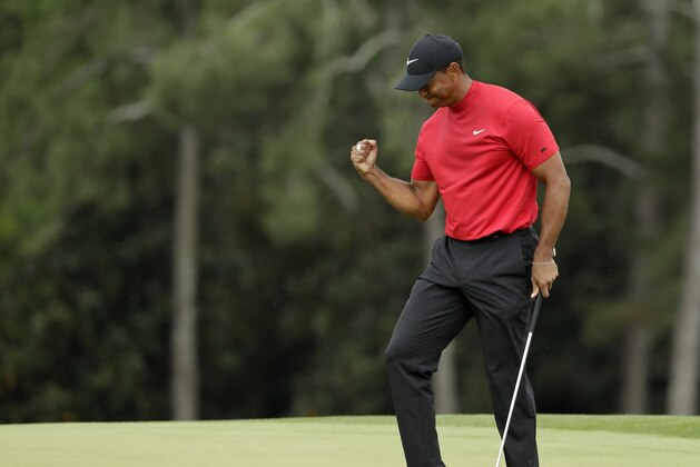 Tiger Woods reacts as he wins the Masters golf tournament Sunday, April 14, 2019, in Augusta, Ga. (AP Photo/Chris Carlson)
