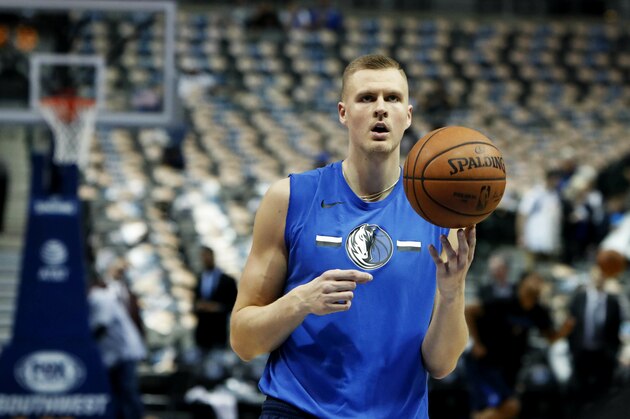 FILE - In this April 3, 2019, file photo, Dallas Mavericks forward Kristaps Porzingis practices before an NBA basketball game against the Minnesota Timberwolves in Dallas. Porzingis was involved in an altercation at a nightclub in his native Latvia. After video showed the 7-foot-3 forward with a bloody forehead, the Mavericks said Sunday, May 12,