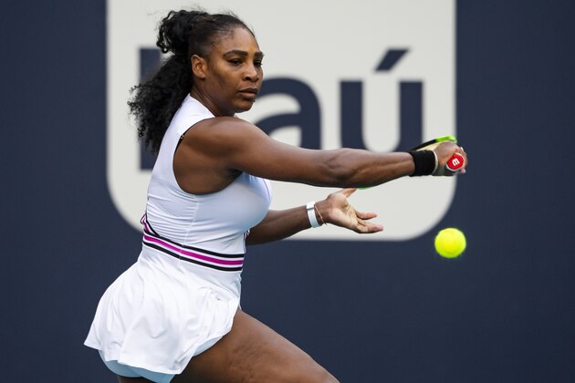 MIAMI GARDENS, FLORIDA - MARCH 21: Serena Williams of the United States hits a backhand against Rebecca Peterson of Sweden in the second round of the women's singles of the Miami Open on March 21, 2019 in Miami Gardens, Florida. (Photo by TPN/Getty Images)