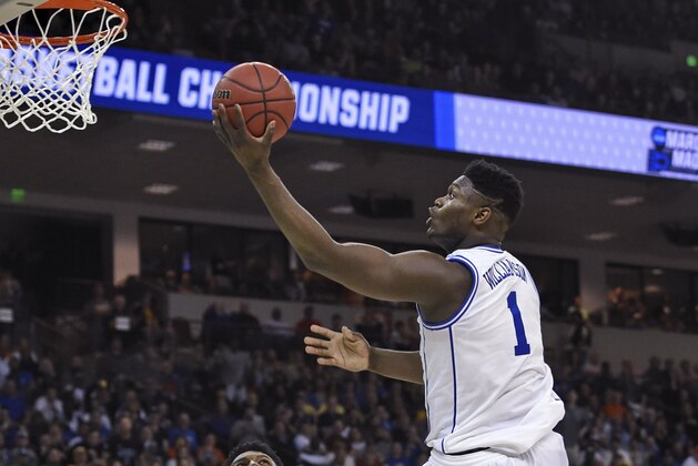 Duke's s Zion Williamson (1) drives to the basket against North Dakota State in a first-round game in the NCAA men’s college basketball tournament in Columbia, S.C., Friday, March 22, 2019. (AP Photo/Richard Shiro)