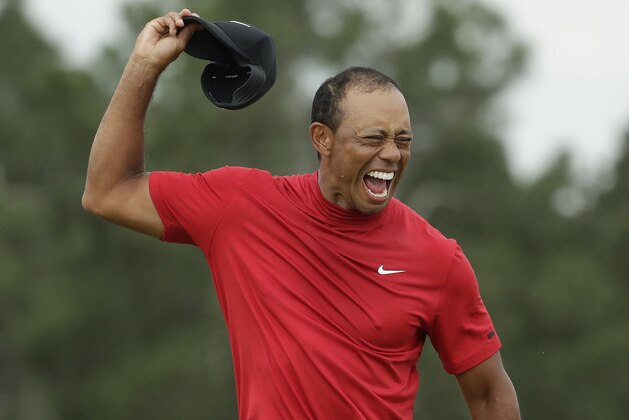 Tiger Woods reacts as he wins the Masters golf tournament Sunday, April 14, 2019, in Augusta, Ga. (AP Photo/Chris Carlson)
