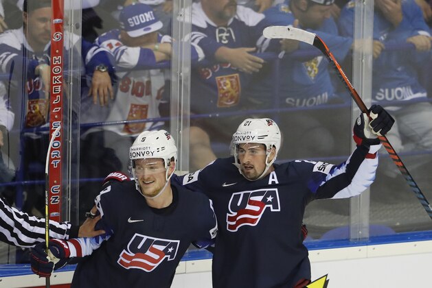 Dylan Larkin of the US, right, celebrates with Jack Eichel of the US, left, after scoring his sides winning goal during the Ice Hockey World Championships group A match between the United States and Finland at the Steel Arena in Kosice, Slovakia, Monday, May 13, 2019. (AP Photo/Petr David Josek)