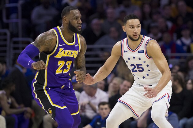 PHILADELPHIA, PA - FEBRUARY 10: LeBron James #23 of the Los Angeles Lakers and Ben Simmons #25 of the Philadelphia 76ers in action at the Wells Fargo Center on February 10, 2019 in Philadelphia, Pennsylvania. The 76ers defeated the Lakers 143-120. NOTE TO USER: User expressly acknowledges and agrees that, by downloading and or using this photograph, User is consenting to the terms and conditions of the Getty Images License Agreement.(Photo by Mitchell Leff/Getty Images)