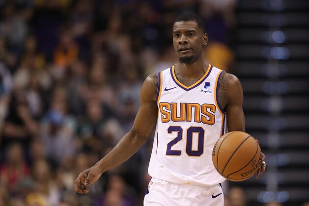 PHOENIX, ARIZONA - APRIL 03:  Josh Jackson #20 of the Phoenix Suns handles the ball during the first half of the NBA game against the Utah Jazz at Talking Stick Resort Arena on April 03, 2019 in Phoenix, Arizona. (Photo by Christian Petersen/Getty Images)