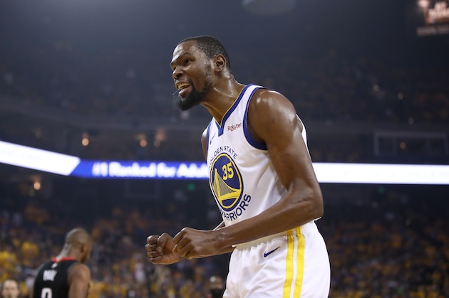 OAKLAND, CALIFORNIA - MAY 08:   Kevin Durant #35 of the Golden State Warriors reacts during their game against the Houston Rockets in Game Five of the Western Conference Semifinals of the 2019 NBA Playoffs at ORACLE Arena on May 08, 2019 in Oakland, California.  NOTE TO USER: User expressly acknowledges and agrees that, by downloading and or using this photograph, User is consenting to the terms and conditions of the Getty Images License Agreement.  (Photo by Ezra Shaw/Getty Images)