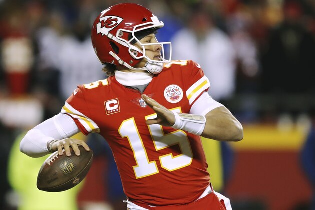 Kansas City Chiefs quarterback Patrick Mahomes throws a pass during the first half of the AFC Championship NFL football game against the New England Patriots, Sunday, Jan. 20, 2019, in Kansas City, Mo. (AP Photo/Charlie Neibergall)