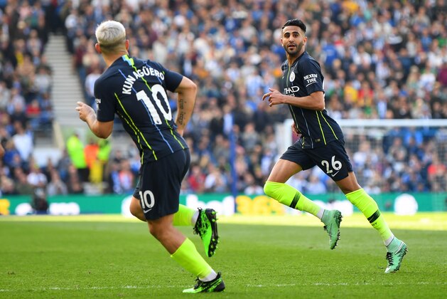 BRIGHTON, ENGLAND - MAY 12: Riyad Mahrez of Manchester City celebrates after scoring his team's third goal during the Premier League match between Brighton & Hove Albion and Manchester City at American Express Community Stadium on May 12, 2019 in Brighton, United Kingdom. (Photo by Michael Regan/Getty Images)