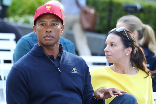 MELBOURNE, AUSTRALIA - DECEMBER 06:  Tiger Woods and his girlfriend Erica Herman look on during a Presidents Cup media opportunity at the Yarra Promenade on December 5, 2018 in Melbourne, Australia. The Presidents Cup 2019 will be held on December 9-15, 2019, when it returns to the prestigious Royal Melbourne Golf Club in Australia.  (Photo by Scott Barbour/Getty Images)