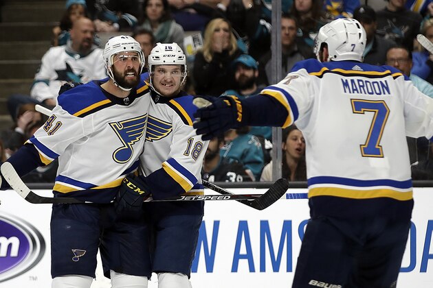 St. Louis Blues' Robert Bortuzzo, left, celebrates with teammates Robert Thomas (18) and Pat Maroon (7) after scoring a goal against the San Jose Sharks in the second period in Game 2 of the NHL hockey Stanley Cup Western Conference finals Monday, May 13, 2019, in San Jose, Calif. (AP Photo/Ben Margot)