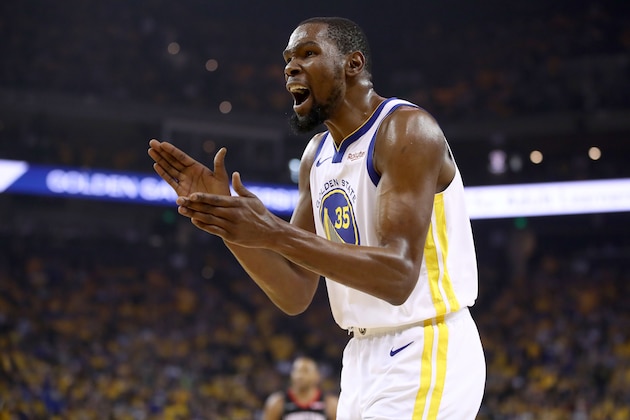 OAKLAND, CALIFORNIA - MAY 08:   Kevin Durant #35 of the Golden State Warriors reacts during their game against the Houston Rockets in Game Five of the Western Conference Semifinals of the 2019 NBA Playoffs at ORACLE Arena on May 08, 2019 in Oakland, California.  NOTE TO USER: User expressly acknowledges and agrees that, by downloading and or using this photograph, User is consenting to the terms and conditions of the Getty Images License Agreement.  (Photo by Ezra Shaw/Getty Images)