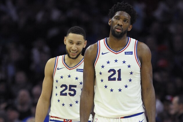 Philadelphia 76ers' Joel Embiid (21) and Ben Simmons are seen during an NBA basketball game against the Oklahoma City Thunder, Saturday, Jan. 19, 2019, in Philadelphia. (AP Photo/Michael Perez)