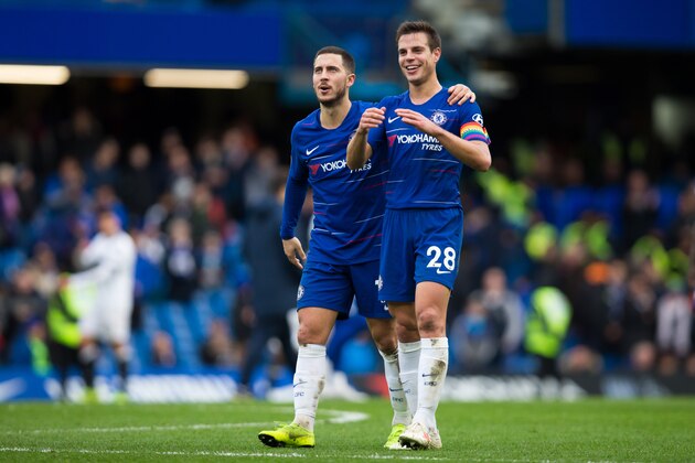 LONDON, ENGLAND - DECEMBER 02: Eden Hazard of Chelsea and team mate Cesar Azpilicueta celebrate their side's victory after the Premier League match between Chelsea FC and Fulham FC at Stamford Bridge on December 2, 2018 in London, United Kingdom. (Photo by Craig Mercer/MB Media/Getty Images)