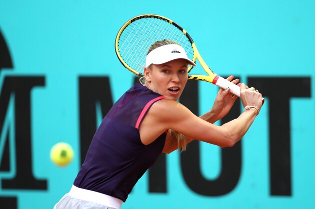 MADRID, SPAIN - MAY 05: Caroline Wozniacki of Denmark returns the ball in her match against Alize Cornet of France during day two of the Mutua Madrid Open at La Caja Magica on May 05, 2019 in Madrid, Spain. (Photo by Alex Pantling/Getty Images)