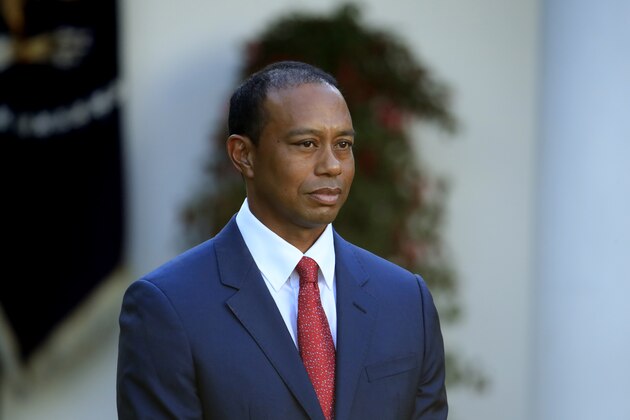 Tiger Woods listens to President Donald Trump during the Presidential Medal of Freedom ceremony in the Rose Garden of the White House in Washington, Monday, May 6, 2019. (AP Photo/Manuel Balce Ceneta)