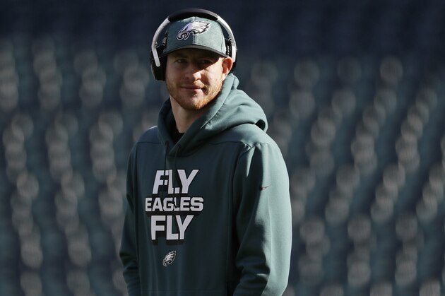 Philadelphia Eagles' Carson Wentz stretches before an NFL football game against the Houston Texans, Sunday, Dec. 23, 2018, in Philadelphia. (AP Photo/Michael Perez)