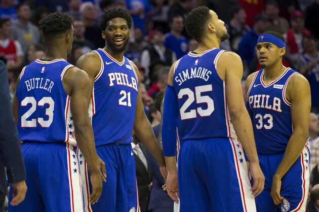 PHILADELPHIA, PA - MARCH 20: Jimmy Butler #23, Joel Embiid #21, Ben Simmons #25, and Tobias Harris #33 of the Philadelphia 76ers look on against the Boston Celtics at the Wells Fargo Center on March 20, 2019 in Philadelphia, Pennsylvania. NOTE TO USER: User expressly acknowledges and agrees that, by downloading and or using this photograph, User is consenting to the terms and conditions of the Getty Images License Agreement.(Photo by Mitchell Leff/Getty Images)