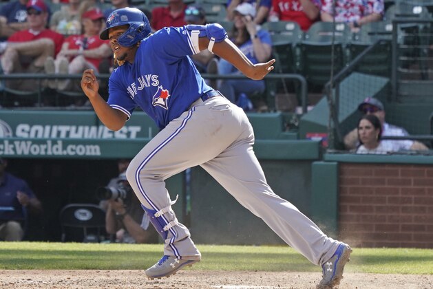 Toronto Blue Jays Vladimir Guerrero Jr. runs to first base after hitting a grounder in the ninth inning against the Texas Rangers during a baseball game in Arlington, Texas on Sunday, May 5, 2019. (AP Photo/ Louis DeLuca)