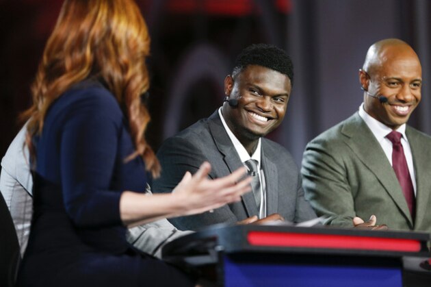 Duke's Zion Williamson, second from right, is interviewed by an ESPN reporter during the NBA basketball draft lottery Tuesday, May 14, 2019, in Chicago. (AP Photo/Nuccio DiNuzzo)