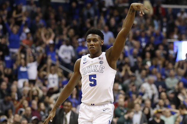 Duke forward RJ Barrett (5) reacts after scoring against Michigan State during the second half of an NCAA men's East Regional final college basketball game in Washington, Sunday, March 31, 2019. (AP Photo/Alex Brandon)