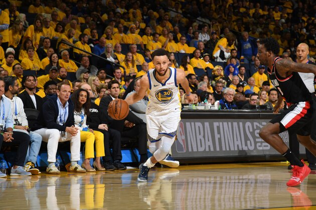 OAKLAND, CA - MAY 14:  Stephen Curry #30 of the Golden State Warriors handles the ball against the Portland Trail Blazers during Game One of the 2019 Western Conference Finals of the NBA Playoffs at the ORACLE Arena on May 14, 2019 in Oakland, California. NOTE TO USER: User expressly acknowledges and agrees that, by downloading and or using this Photograph, user is consenting to the terms and conditions of the Getty Images License Agreement. Mandatory Copyright Notice: Copyright 2019 NBAE (Photo by Noah Graham/NBAE via Getty Images)