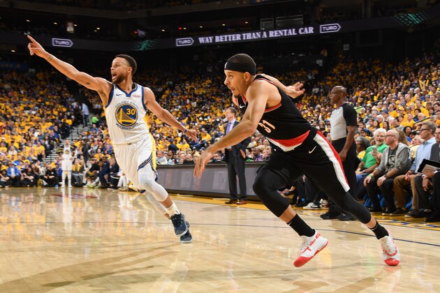 OAKLAND, CA - MAY 14: Stephen Curry #30 of the Golden State Warriors and Seth Curry #31 of the Portland Trail Blazers run on during Game One of the 2019 Western Conference Finals of the NBA Playoffs at the ORACLE Arena on May 14, 2019 in Oakland, California. NOTE TO USER: User expressly acknowledges and agrees that, by downloading and or using this Photograph, user is consenting to the terms and conditions of the Getty Images License Agreement. Mandatory Copyright Notice: Copyright 2019 NBAE (Photo by Andrew D. Bernstein/NBAE via Getty Images)