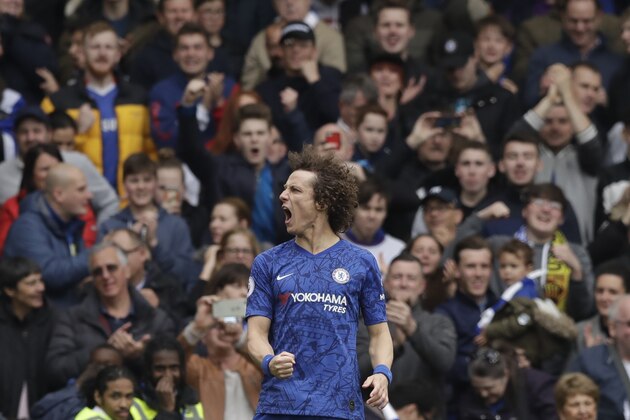 Chelsea's David Luiz celebrates after scoring his side's second goal during the English Premier League soccer match between Chelsea and Watford at Stamford Bridge stadium in London, Sunday, May 5, 2019. (AP Photo/Matt Dunham)