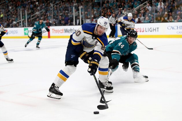 SAN JOSE, CALIFORNIA - MAY 13:   Alexander Steen #20 of the St. Louis Blues and Marc-Edouard Vlasic #44 of the San Jose Sharks go for the puck  in Game Two of the Western Conference Final during the 2019 NHL Stanley Cup Playoffs at SAP Center on May 13, 2019 in San Jose, California. (Photo by Ezra Shaw/Getty Images)