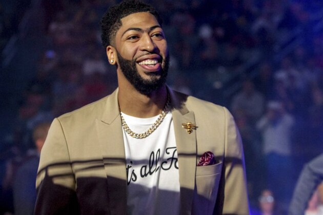 New Orleans Pelicans forward Anthony Davis (23) wears a T-shirt with 'That's All, Folks,' printed on it during player introduction before an NBA basketball game between the New Orleans Pelicans and the Golden State Warriors in New Orleans, Tuesday, April 9, 2019. (AP Photo/Scott Threlkeld) New Orleans Pelicans forward Anthony Davis (23) wears a T-shirt with 'That's All, Folks,' printed on it during player introduction before an NBA basketball game between the New Orleans Pelicans and the Golden State Warriors in New Orleans, Tuesday, April 9, 2019. (AP Photo/Scott Threlkeld)