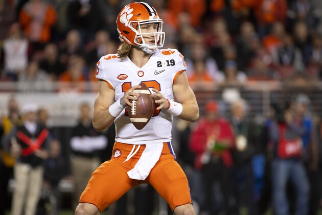 SANTA CLARA, CA - JANUARY 07: Trevor Lawrence #16 of the Clemson Tigers throws a touchdown against the Alabama Crimson Tide during the College Football Playoff National Championship held at Levi's Stadium on January 7, 2019 in Santa Clara, California. The Clemson Tigers defeated the Alabama Crimson Tide 44-16. (Photo by Jamie Schwaberow/Getty Images)
