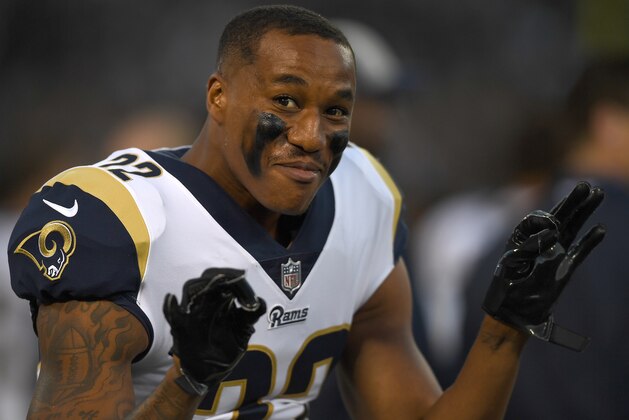 OAKLAND, CA - SEPTEMBER 10:  Marcus Peters #22 of the Los Angeles Rams looks on smiling from the sidelines prior to the start of an NFL football game against the Oakland Raiders at Oakland-Alameda County Coliseum on September 10, 2018 in Oakland, California.  (Photo by Thearon W. Henderson/Getty Images)