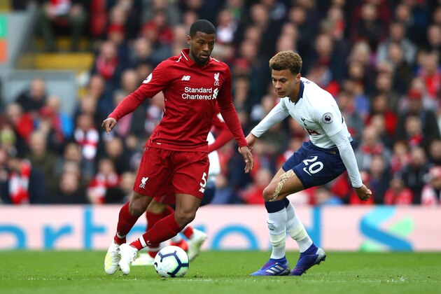 LIVERPOOL, ENGLAND - MARCH 31:  Georginio Wijnaldum of Liverpool and Dele Alli of Tottenham Hotspur during the Premier League match between Liverpool FC and Tottenham Hotspur at Anfield on March 31, 2019 in Liverpool, United Kingdom. (Photo by Clive Brunskill/Getty Images)