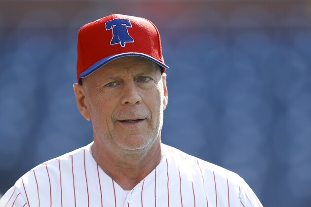 Actor Bruce Willis watches batting practice before a baseball game between the Philadelphia Phillies and the Milwaukee Brewers, Wednesday, May 15, 2019, in Philadelphia. (AP Photo/Matt Slocum)