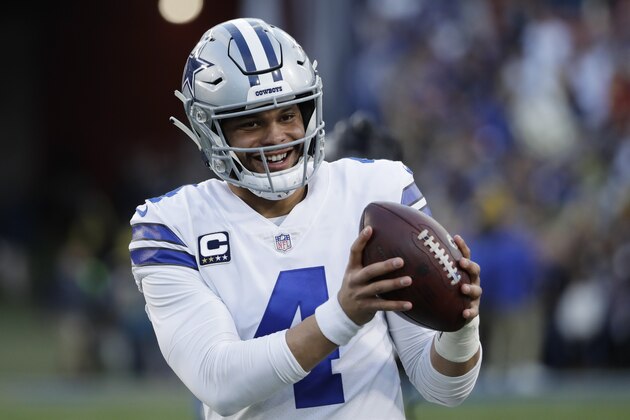 Dallas Cowboys quarterback Dak Prescott warms up before an NFL divisional football playoff game against the Los Angeles Rams Saturday, Jan. 12, 2019, in Los Angeles. (AP Photo/Marcio Jose Sanchez)