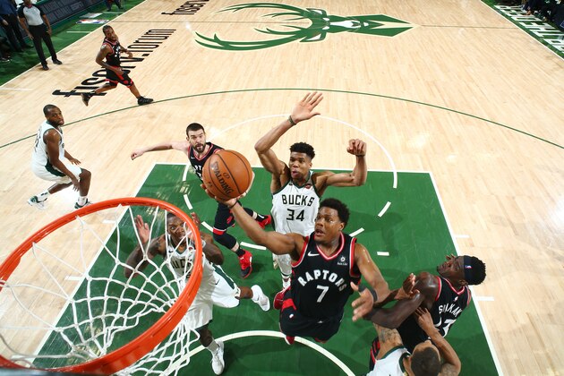 MILWAUKEE, WI - MAY 15: Giannis Antetokounmpo #34 of the Milwaukee Bucks goes for the block against Kyle Lowry #7 of the Toronto Raptors during Game One of the Eastern Conference Finals of the 2019 NBA Playoffs on May 15, 2019 at the Fiserv Forum Center in Milwaukee, Wisconsin. NOTE TO USER: User expressly acknowledges and agrees that, by downloading and or using this Photograph, user is consenting to the terms and conditions of the Getty Images License Agreement. Mandatory Copyright Notice: Copyright 2019 NBAE (Photo by Nathaniel S. Butler/NBAE via Getty Images). MILWAUKEE, WI - MAY 15: Giannis Antetokounmpo #34 of the Milwaukee Bucks goes for the block against Kyle Lowry #7 of the Toronto Raptors during Game One of the Eastern Conference Finals of the 2019 NBA Playoffs on May 15, 2019 at the Fiserv Forum Center in Milwaukee, Wisconsin. NOTE TO USER: User expressly acknowledges and agrees that, by downloading and or using this Photograph, user is consenting to the terms and conditions of the Getty Images License Agreement. Mandatory Copyright Notice: Copyright 2019 NBAE (Photo by Nathaniel S. Butler/NBAE via Getty Images).