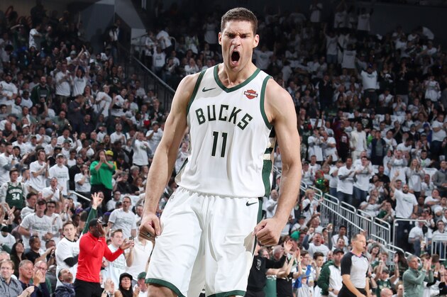 MILWAUKEE, WI - MAY 15: Brook Lopez #11 of the Milwaukee Bucks handles the ball against the Toronto Raptors during Game One of the Eastern Conference Finals of the 2019 NBA Playoffs on May 15, 2019 at the Fiserv Forum Center in Milwaukee, Wisconsin. NOTE TO USER: User expressly acknowledges and agrees that, by downloading and or using this Photograph, user is consenting to the terms and conditions of the Getty Images License Agreement. Mandatory Copyright Notice: Copyright 2019 NBAE (Photo by Nathaniel S. Butler/NBAE via Getty Images).